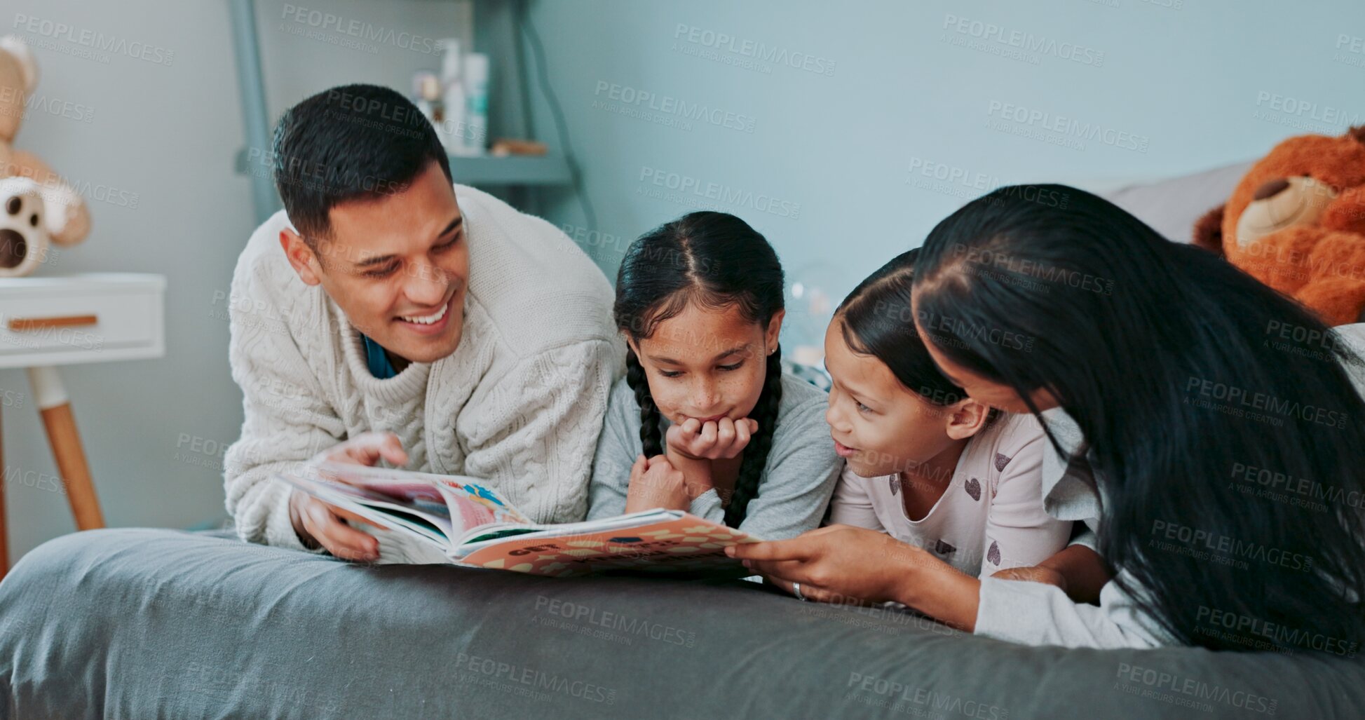 Buy stock photo Reading, parents and children with book on bed for education, learning or storytelling in bedroom, Family, hispanic woman and happy man with girl kids for bonding, development or relax in home