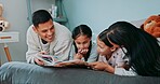 Book, night and reading with family in bedroom of home together for bonding, love or storytelling. Education, learning or relax with mother, father and kids on bed in apartment for child development