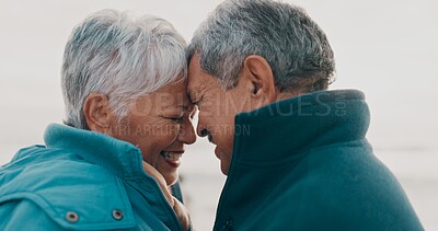 Buy stock photo Forehead, love and senior couple on beach together for holiday bonding, retirement or vacation. Anniversary, romance or smile with elderly man and woman on tropical island coast for peace or travel