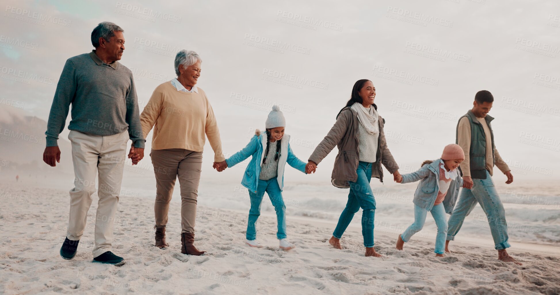 Buy stock photo African family, holding hands and beach holiday with happiness or wellness, together for travel with support. People, ocean and chain on vacation with love or trust, smile for freedom in Costa Rica