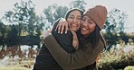 Happy, girl and friends in nature outdoor for camping, adventure weekend and trail hiking for bonding. Female people, embrace and together in wilderness for exploration, getaway and affection.