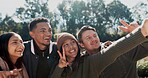 Selfie, smile and friends in nature outdoor for camping, adventure weekend and trail hiking for bonding. People, photography and peace sign together in wilderness for memory, social media and post.