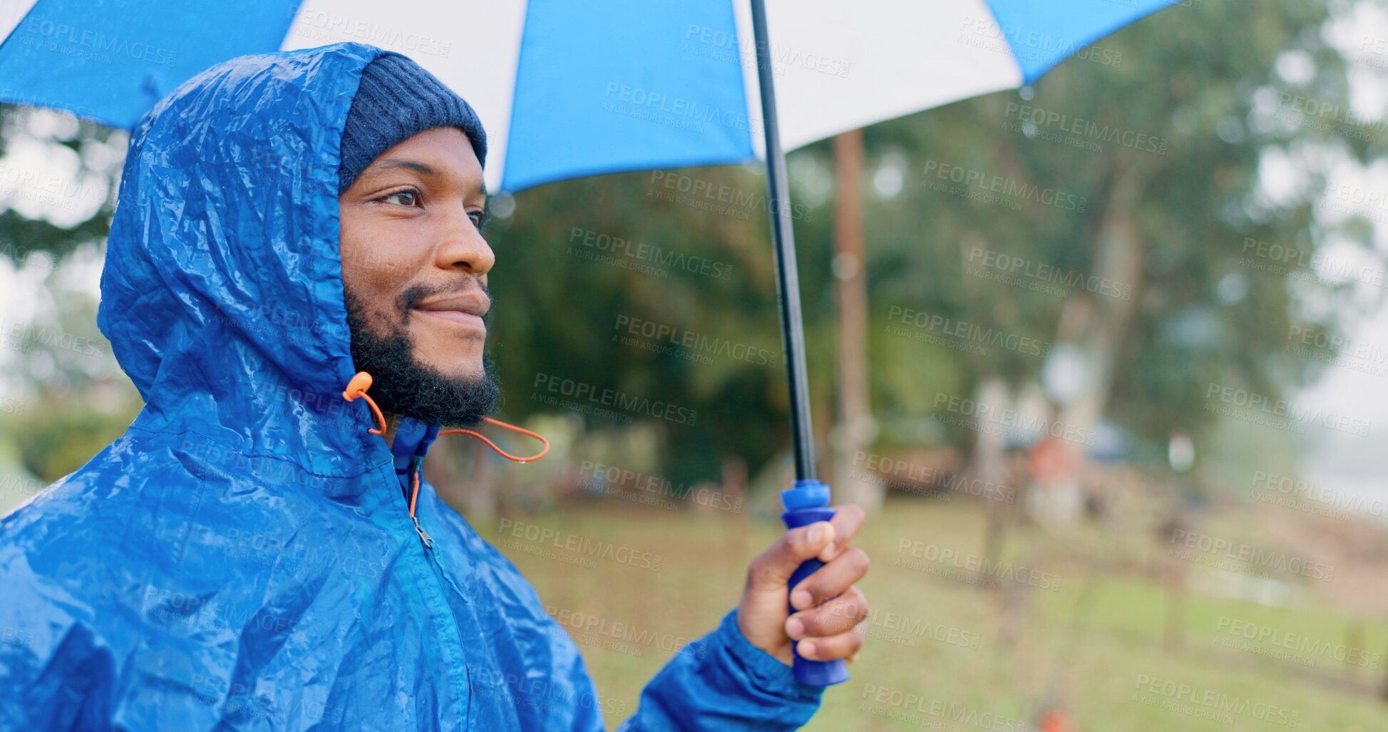 Buy stock photo Black man, thinking and umbrella for rain outdoor on camping adventure, explore and nature mockup in morning. African, male person and smile for hiking, safety and trekking woods for winter vacation

