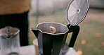 Coffee, camping and outdoor on adventure and hiking with percolator for hot drink and espresso. Vacation, nature and winter with tent, brewing and metal filter for warm cup in the morning on a trip 