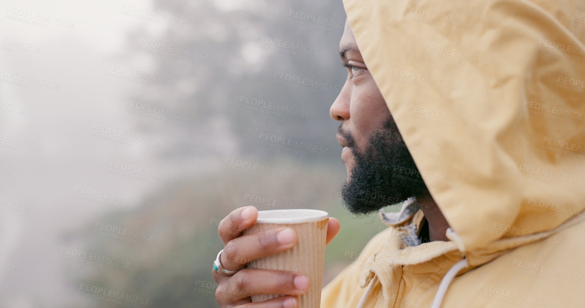 Buy stock photo Coffee, thinking and black man drinking in storm for hiking, travel and relax in morning outdoor in winter. Tea, peace and mindfulness in nature for adventure, camping or rain with raincoat as break