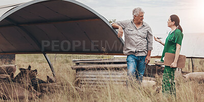 Buy stock photo Shot of a veterinarian talking to a mature man on his farm