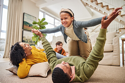 Buy stock photo Home airplane and family on floor for playing with smile for bonding together in living room. Smile, care and children having fun with parents for connection on carpet in lounge at house in Mexico.