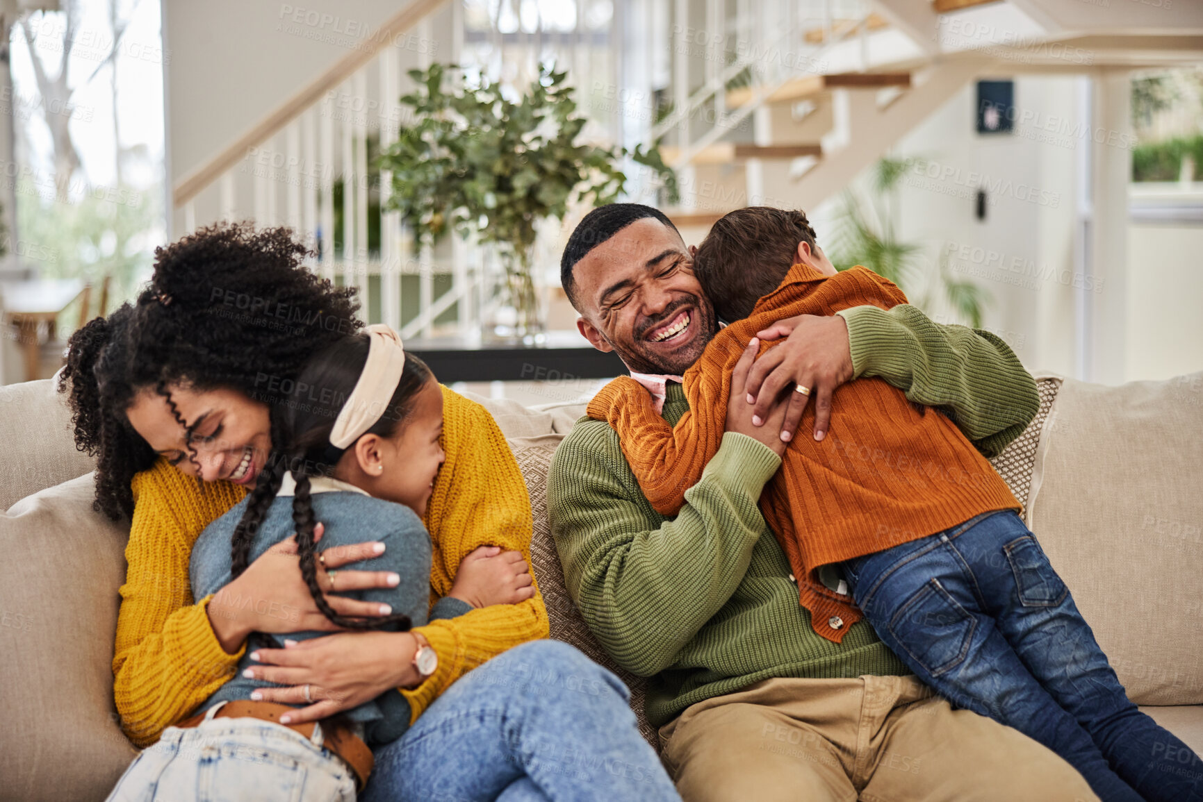 Buy stock photo Happy, parents and kids with hug on sofa for appreciation, gratitude and safety in family at home. Mother, father and smile with affection of children in living room for connection, support and love