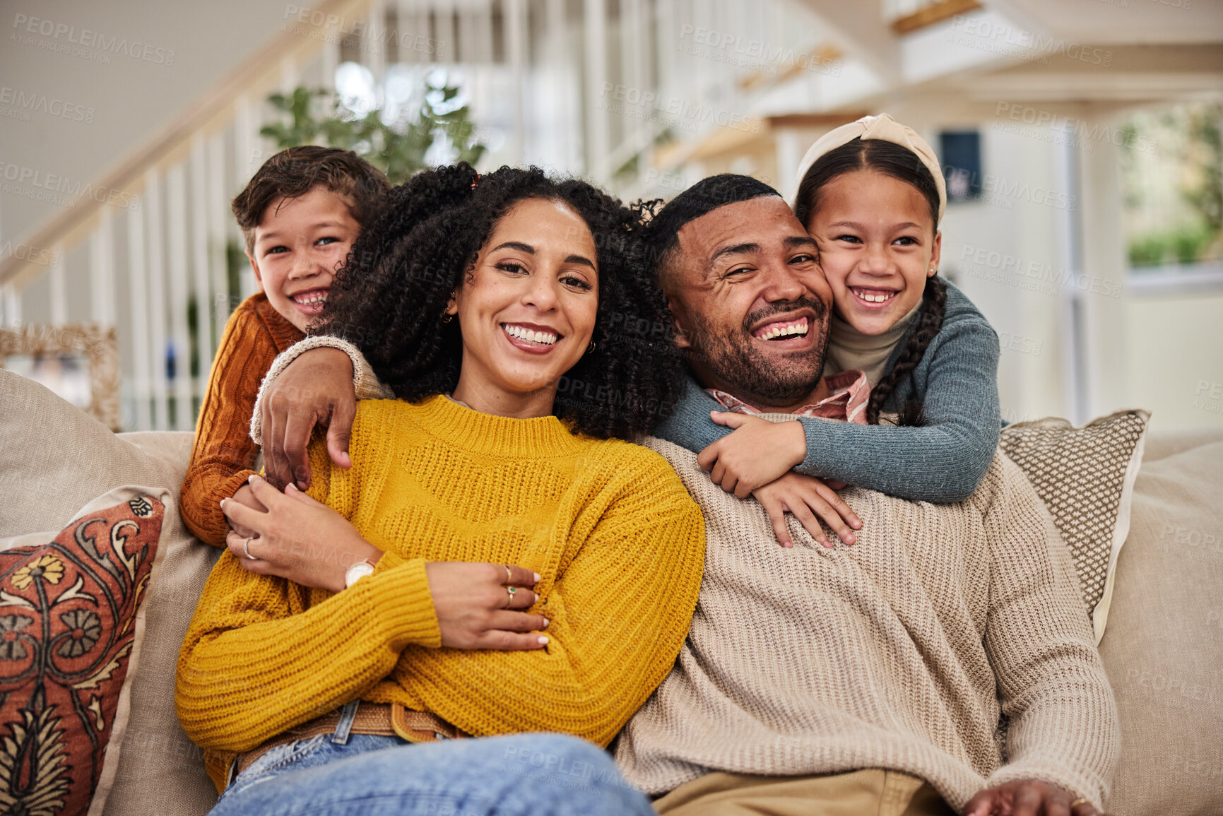 Buy stock photo Happiness, portrait of family and hug on sofa for love, weekend fun and relationship development at home. Mom, father and kids on couch with smile, excited and together for support in modern house