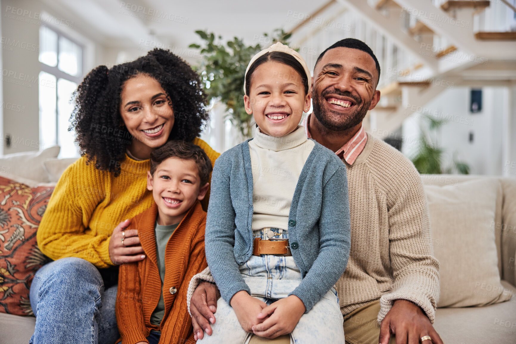 Buy stock photo Happy family, portrait and smile on sofa for love, weekend fun and relationship development at home. Mom, dad and children on couch with laughing, excited and support or care in modern house