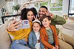 Selfie, happy family and peace sign in home with childhood, nurture and lounge in bonding together. Mom, dad and siblings in house for memory, photography and funny faces for parents, kids and growth