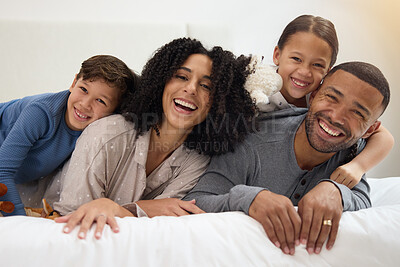 Buy stock photo Family, portrait and support in home on bed with smile for wellness, relationship and trust in morning. Parents, face and children in bedroom for happy, bonding and relax together with hug on weekend