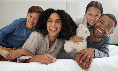 Buy stock photo Family, portrait and support in home bedroom with smile for wellness, relationship and trust in morning. Parents, face and children on bed for happy, bonding and relax together with hug on weekend