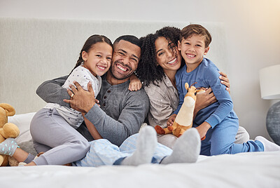 Buy stock photo Family, portrait and hug in home bedroom with smile for wellness, relationship and trust in morning. Parents, face and children on bed for happy, bonding and relax together with support on weekend