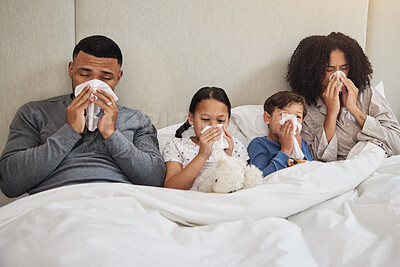 Buy stock photo Family, sick and blowing nose in bed for allergies, flu and common cold in bedroom. Parents, children and tissues at home for recovery, congestion and contagious viral disease or covid 19 symptoms