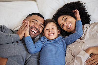 Buy stock photo Family, portrait and care on bed with smile for wellness, relationship or trust in morning in home. Parents, face and children in bedroom for happy, bonding and relax together with support on weekend