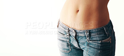 Buy stock photo Sexy, denim and stomach of woman in jeans for fitness, fashion and beauty. Health, diet and skincare with abs and body of girl in pants for wellness, cosmetics and sexual isolated on white background