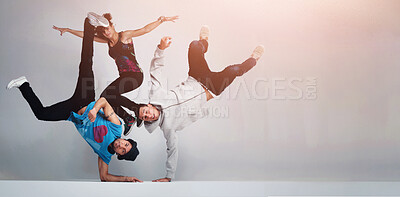 Buy stock photo Portrait of a group of young hip hop dancers showing different dancing poses