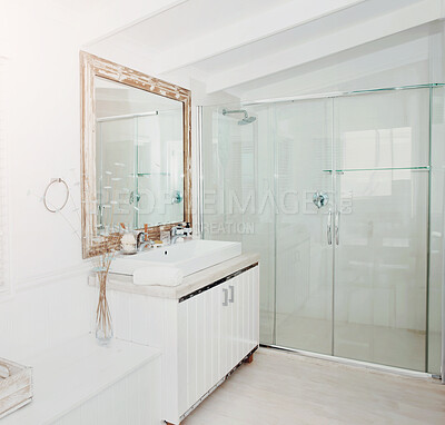 Buy stock photo Luxury, mirror and shower in the bathroom interior of a modern home or apartment for lifestyle. Hotel, real estate or wealth with marble, ceramic tiles and a vanity against a wall for design