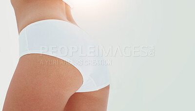 Buy stock photo Butt, skincare and woman in underwear for wellness, liposuction and diet by white background. Beauty, natural and closeup of bum of female model with lingerie for dermatology and epilation in studio.