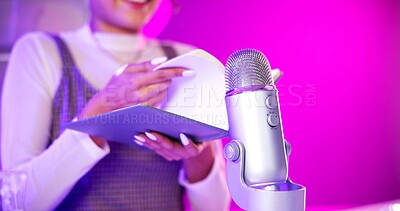 Buy stock photo Book, ASMR and hands with microphone, woman and neon lights with podcast, content creation and tech. Home, broadcast and audio for stress relief with person influencer with recording for sound