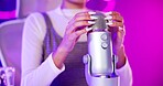 Nails, ASMR and hands with microphone, woman and neon lights with podcast, content creation and tech. Home, broadcast and audio for stress relief with person influencer with recording for sound