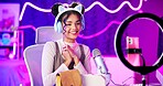 Home content creator, girl and live streaming with phone, mic and tech in neon light for social media followers. Bedroom streamer, influencer or young woman talking and recording with makeup review