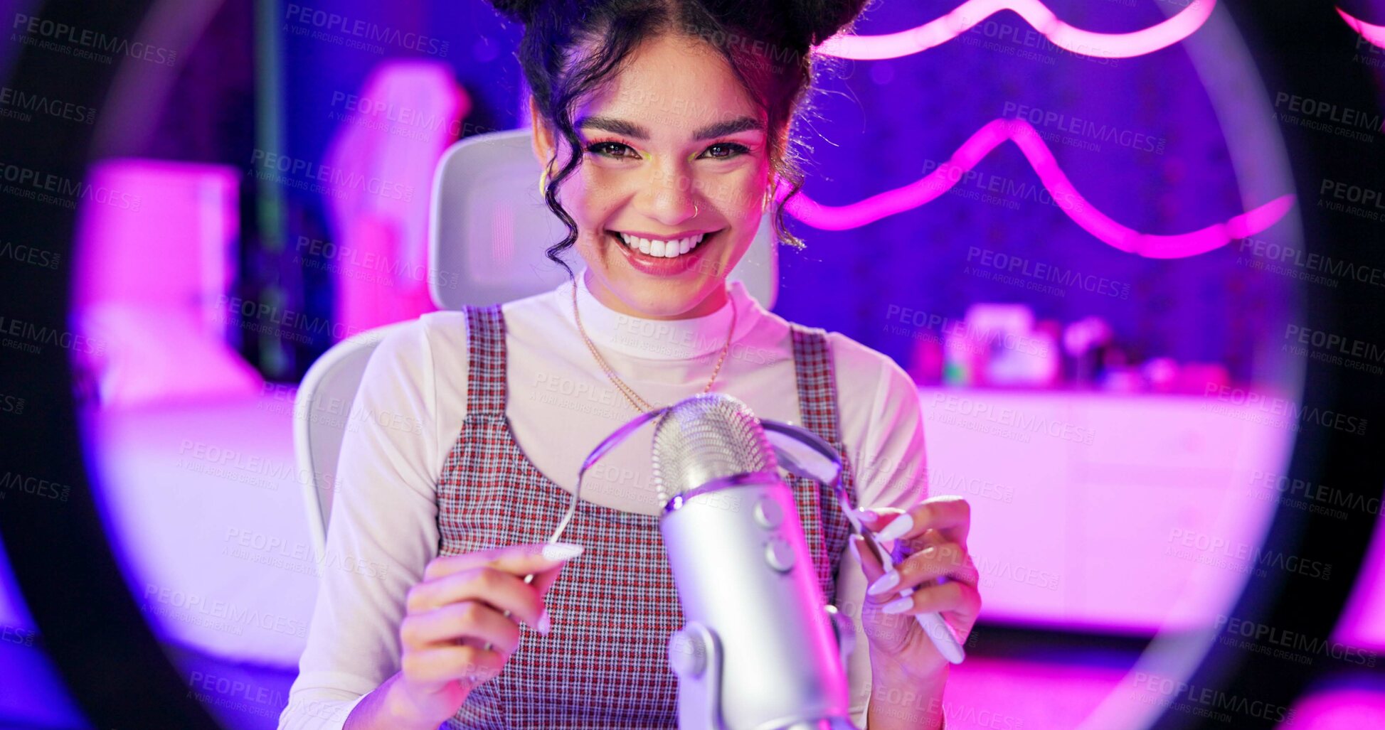 Buy stock photo Content creator, influencer and portrait of woman with microphone, neon ring light and ASMR in home studio. Smile, streamer or happy girl recording video for sound therapy live stream with cutlery