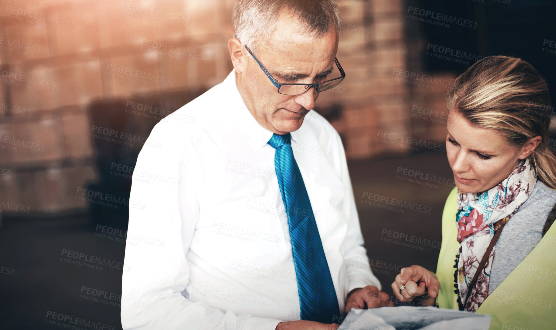 Buy stock photo Mature man, woman and documents at warehouse with reading, invoice or advice in supply chain management. People, paperwork and logistics industry with compliance for cargo, distribution or package