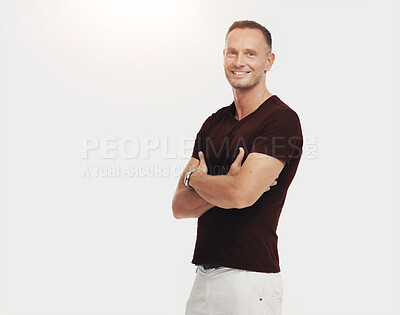 Buy stock photo Portrait, mockup and fashion with a man in studio isolated on a white background standing arms crossed. Marketing, advertising and mock up with a mature male posing on black product placement space