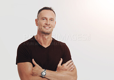 Buy stock photo Happy man, portrait or confident in studio space with pride, fashion or fitness in Canada. Mature person, arms crossed and personal trainer on white background mockup for join us, smile and aesthetic