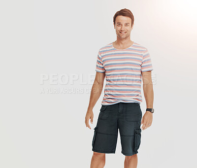 Buy stock photo Casual young man standing feeling relaxed while isolated on white