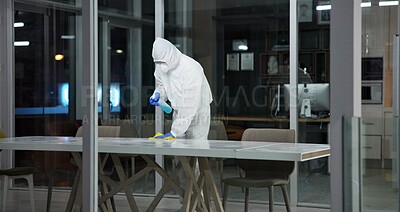 Buy stock photo Cleaner, person and cleaning table office for fumigation, spray disinfect and safety suit from disease risk in building. Maintenance, chemical liquid and pest control of healthcare, hygiene and virus