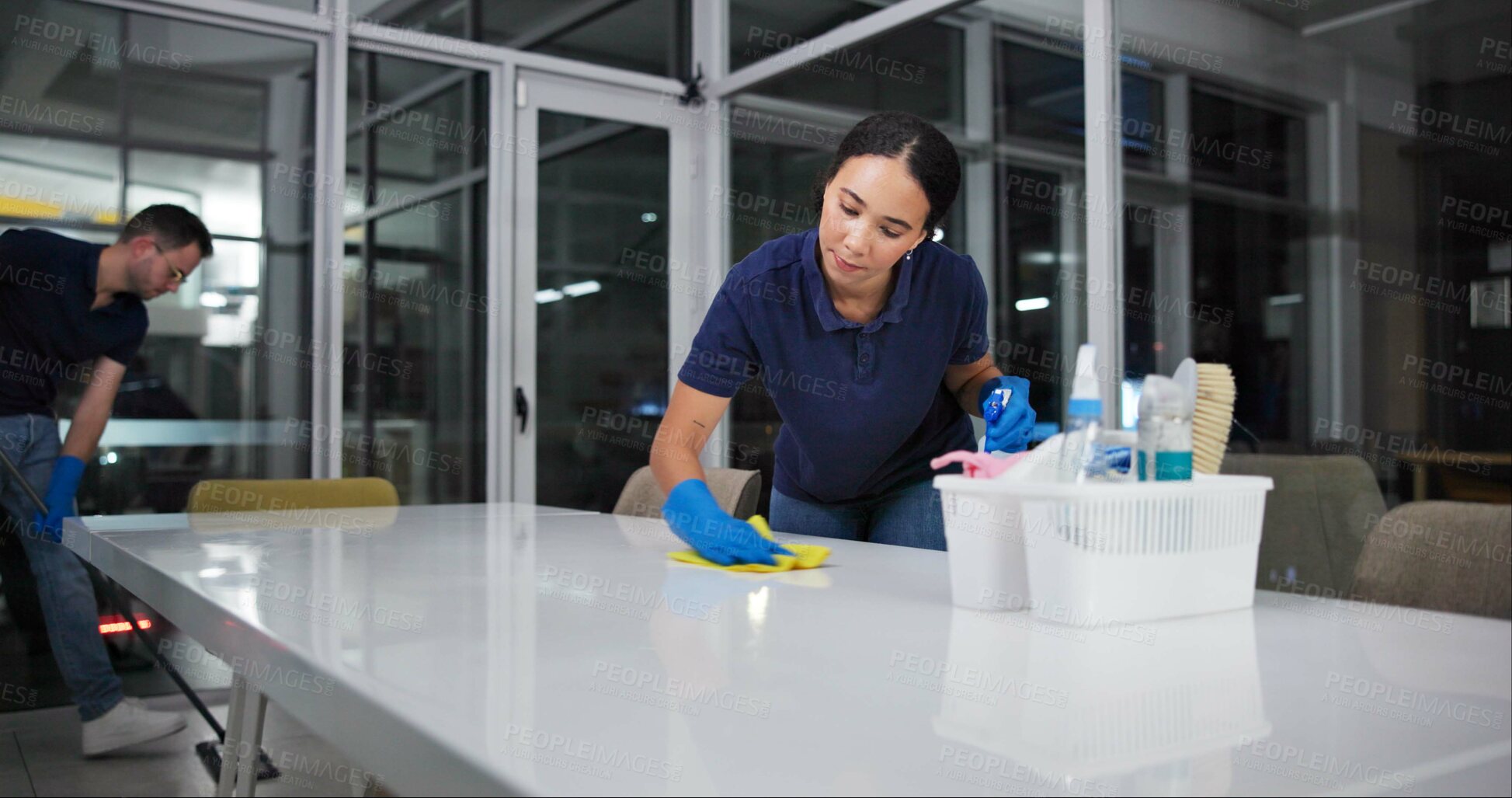 Buy stock photo Cleaner, woman and cleaning table office for fumigation, spray disinfect and safety suit from disease risk in building. Maintenance, person and chemical liquid for pest control, health and hygiene