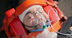 Person, accident and emergency on road with oxygen for life support, medical response to trauma with ventilation. Safety, first aid or health insurance or air mask for breath on street, ems or crisis