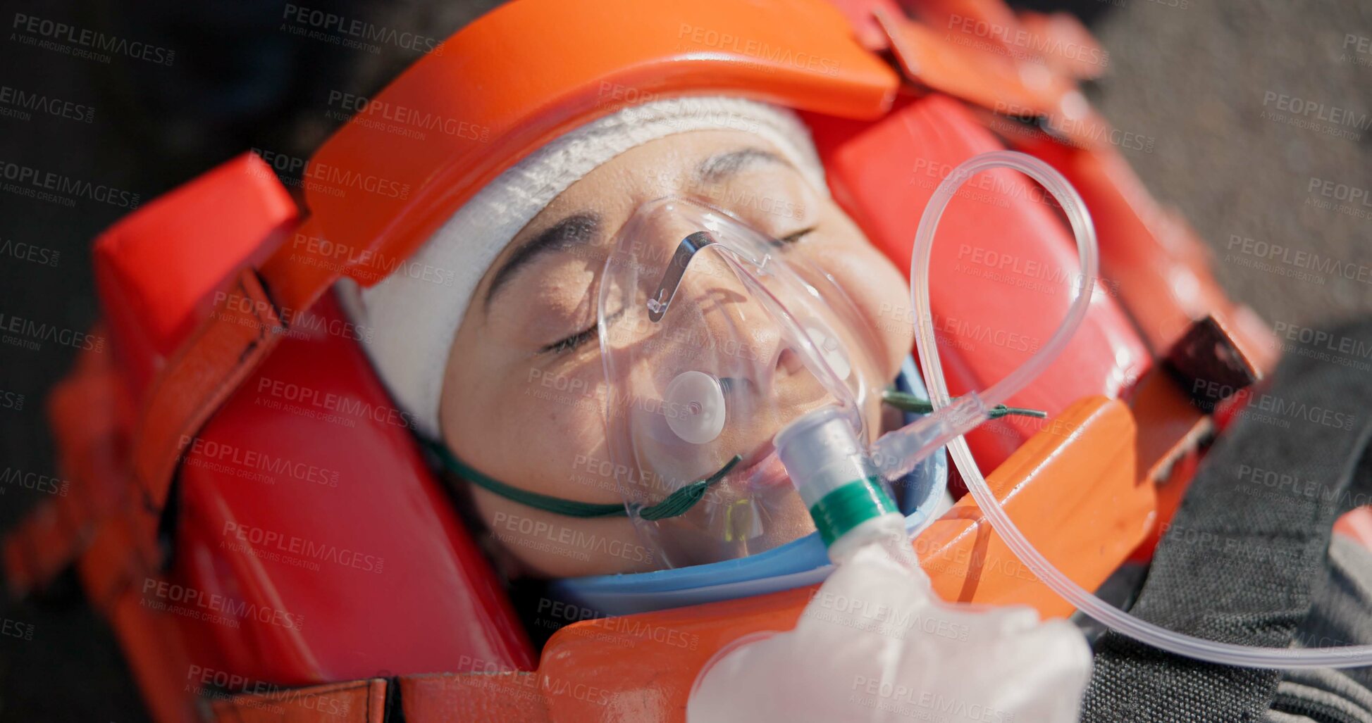 Buy stock photo Person, accident and emergency on road with oxygen for life support, medical response to trauma with ventilation. Safety, first aid or health insurance or air mask for breath on street, ems or crisis