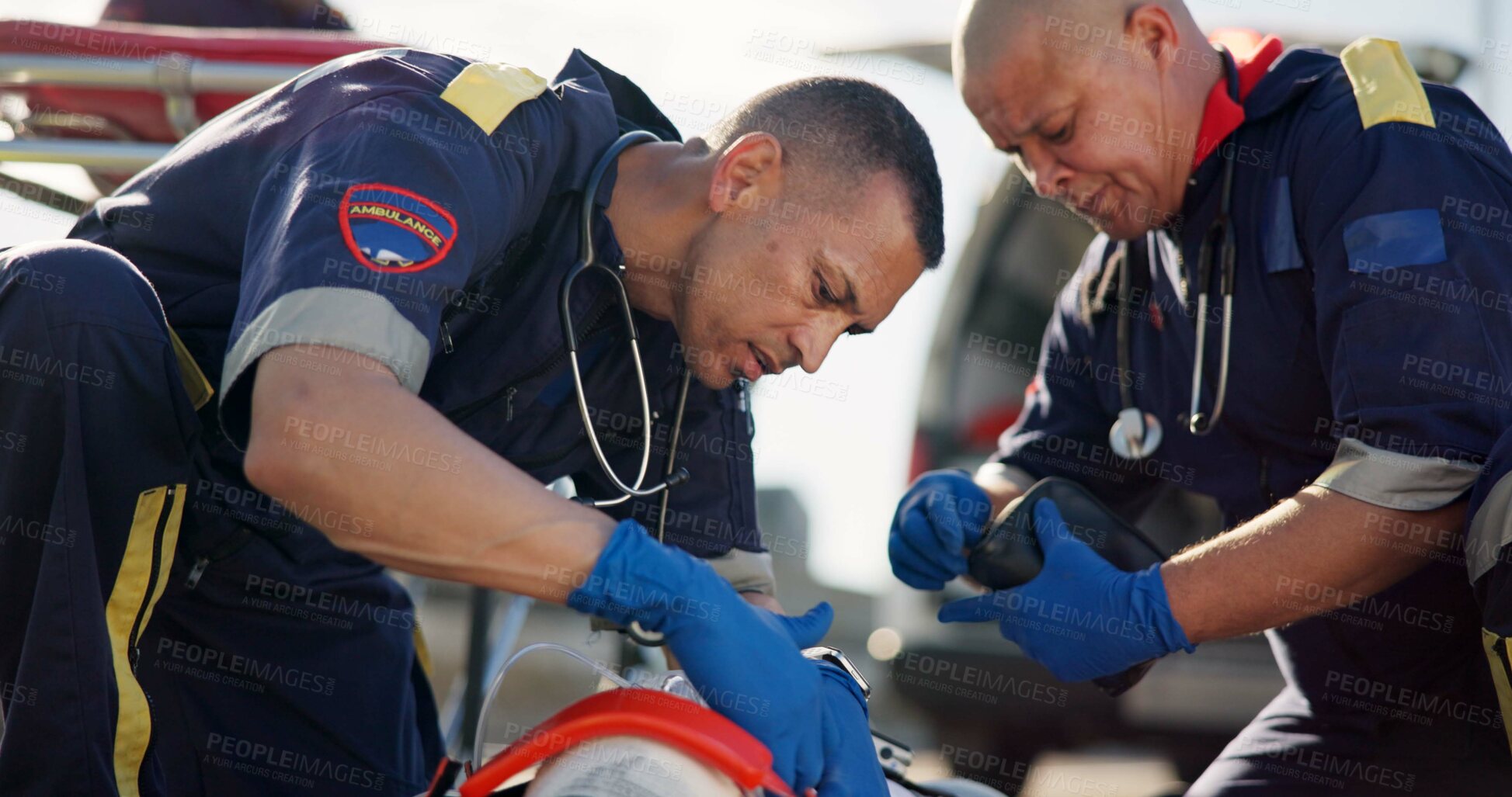 Buy stock photo Paramedic, emergency and men with accident in road for first aid, resuscitation and rescue service. Medical crisis, healthcare and EMS responder with saving for car crash,  help or patient assessment