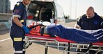 Person, accident or emergency on road with stretcher for life support, medical or trauma with ventilation. Safety, first aid or health insurance or air mask for breath on street, ems or crisis