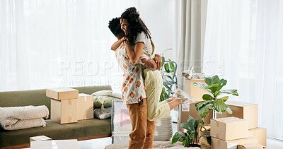 Buy stock photo Happy couple, boxes and moving house with hug, new home and milestone in bonding or together. Woman, man and excited in embrace for relationship, support and progress with pride, celebration and love