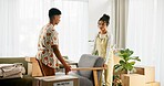 Happy couple, boxes and moving house with furniture, new home and milestone in bonding together. Woman, man and decorate in lounge with marriage, support and progress for pride, love and relationship