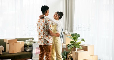 Buy stock photo Couple, dance and happy in new home with people, moving and celebrating mortgage for relationship bonding together. Boxes, homeowners and weekend break for property investment, smile and house