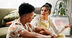 Couple, boxes and moving house with argument, new home and stress in fighting, conflict or upset. Woman, man and talking in lounge with marriage, unhappy or discussion for pride, love or relationship