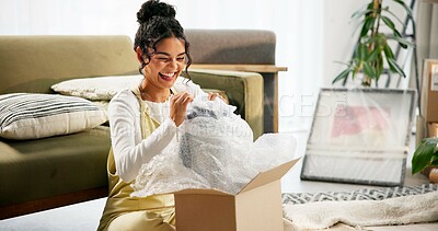 Buy stock photo Living room, box and moving in house, woman and investment of real estate, excited and unpacking of gift. Furniture, cardboard and new home with loan, mortgage and property of apartment or relocation