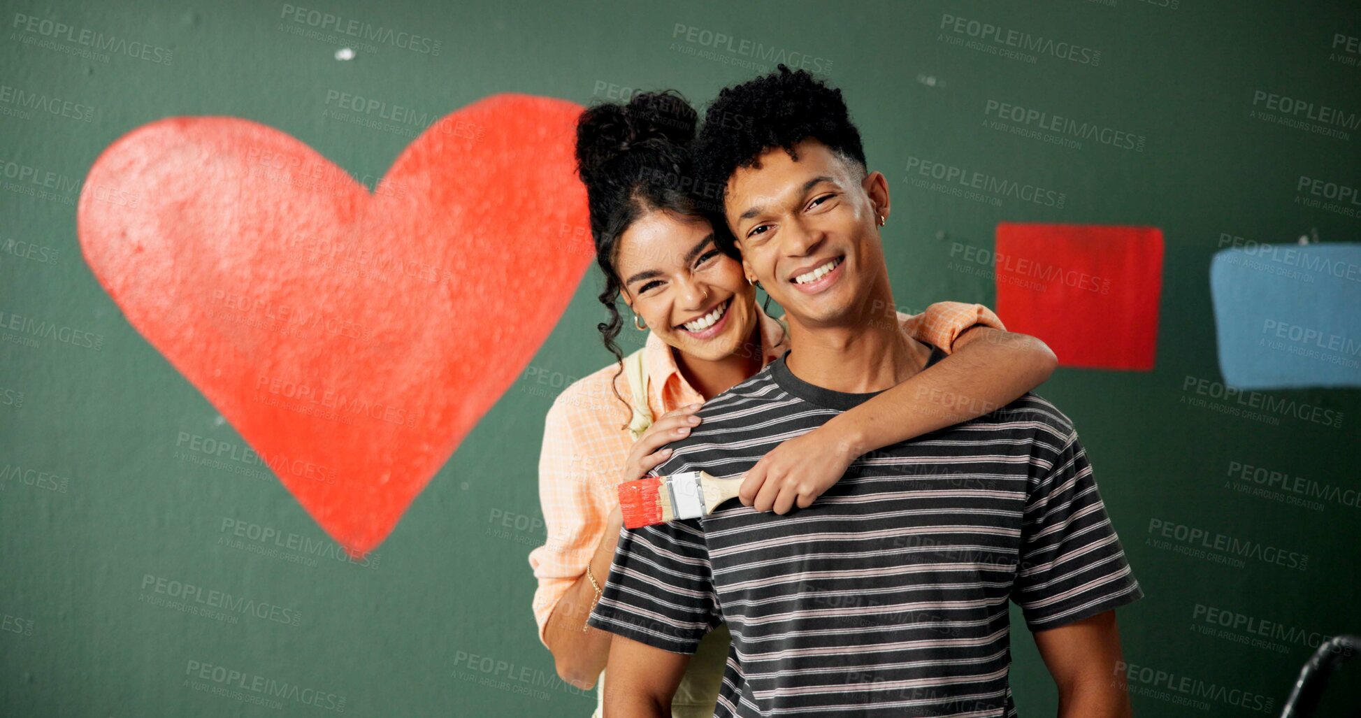 Buy stock photo Portrait, love and couple hug in painting renovation, DIY or remodel by green wall in room for improvement. Romantic, man and woman in house together working with smile, heart shape or fun teamwork 