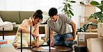 Couple, people and assemble table with manual for instructions and tips in new home. House, relationship and boxes for moving in with diy, furniture and ownership in living room for renovations