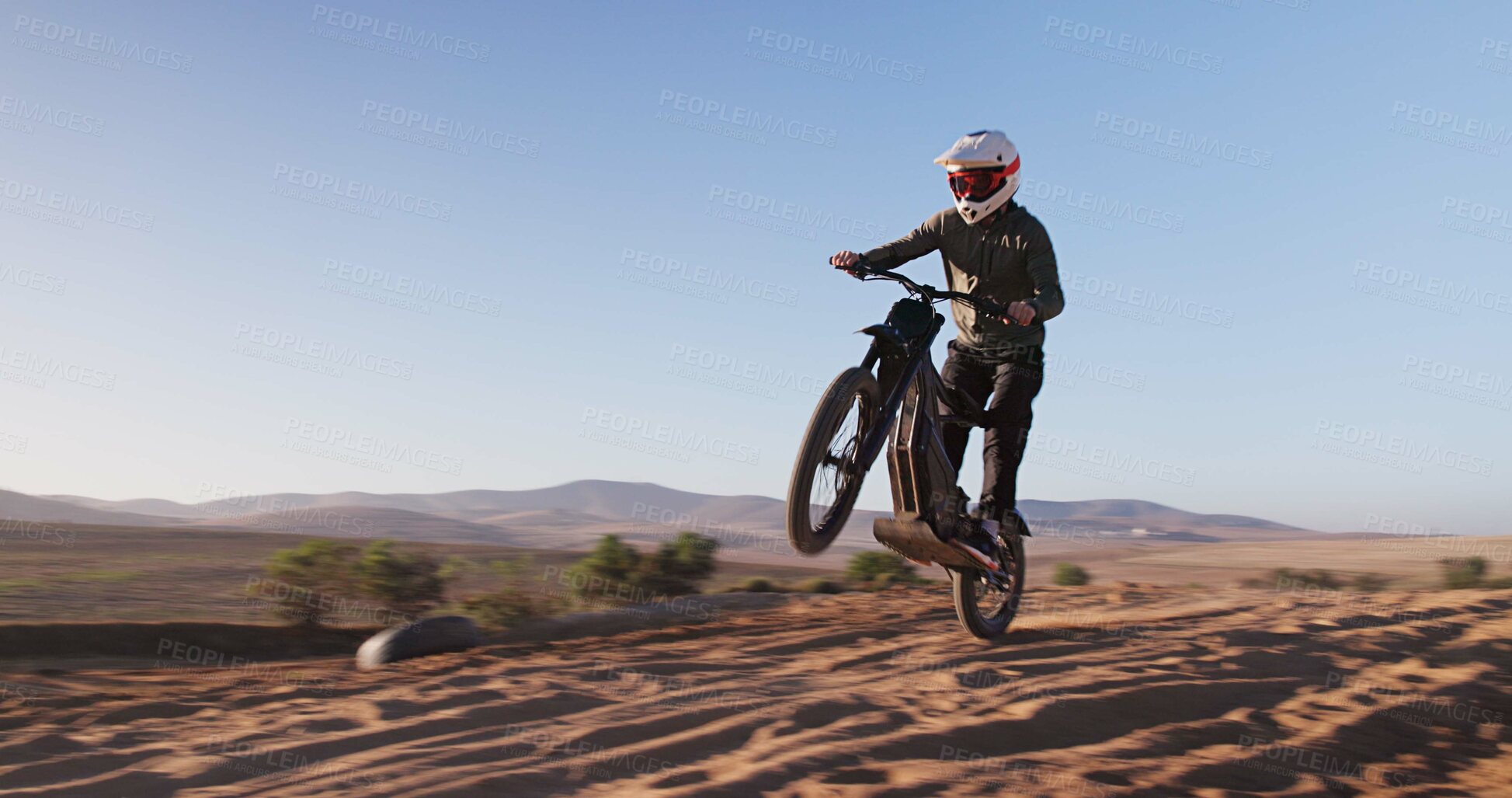 Buy stock photo Driver, driving and motorbike with jump of sports for cross country training, performance technique and fitness journey. Athlete, person and bicycle for travel adventure, dirt cycling and race rally