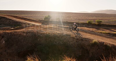 Buy stock photo Driving, person and motorbike in desert of sports for cross country training, performance technique and fitness journey. Athlete, driver and bicycle for travel adventure, dirt cycling and race rally