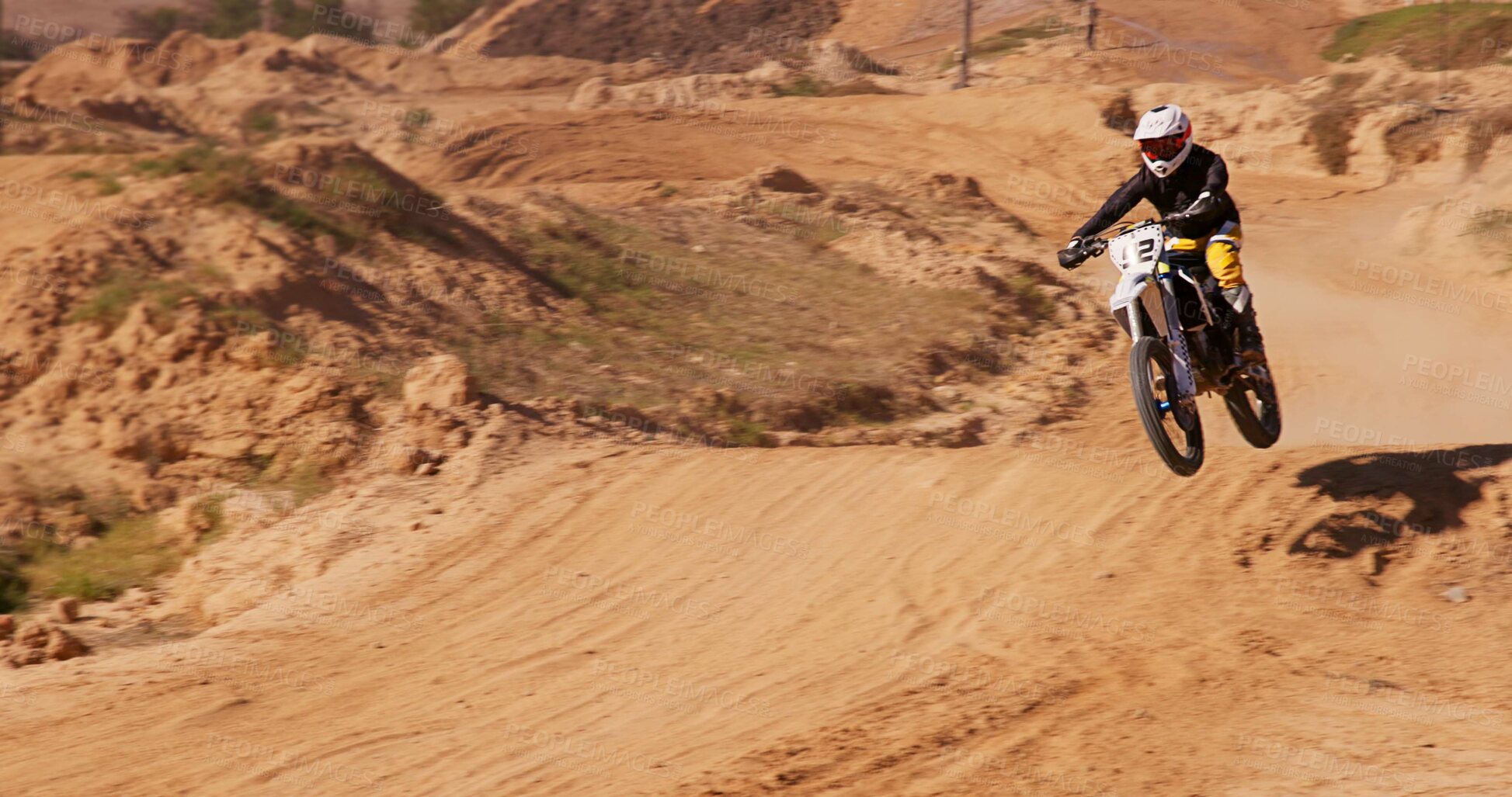 Buy stock photo Rider, dirt and motorbike with jump of sports for speed training, performance technique and fitness challenge. Athlete, person and motorcycle power for travel adventure, cycling and race rally