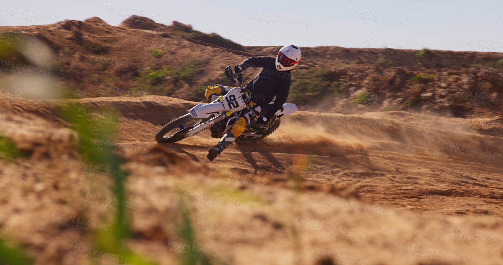 Buy stock photo Person, desert and riding on motorbike for sport of speed training, performance technique and fitness journey. Athlete, rider and sports bike for travel adventure, dirt drifting and race rally