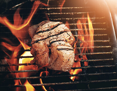 Buy stock photo Closeup of a tasty steak cooking on a fire